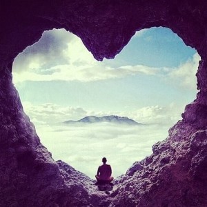 monk in heart cave meditating